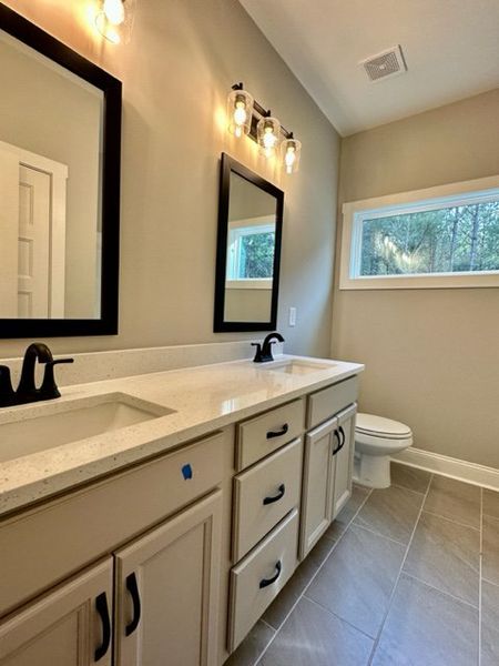 Furnished interior in a model home at Polk Place in Moreland (Image 3).
