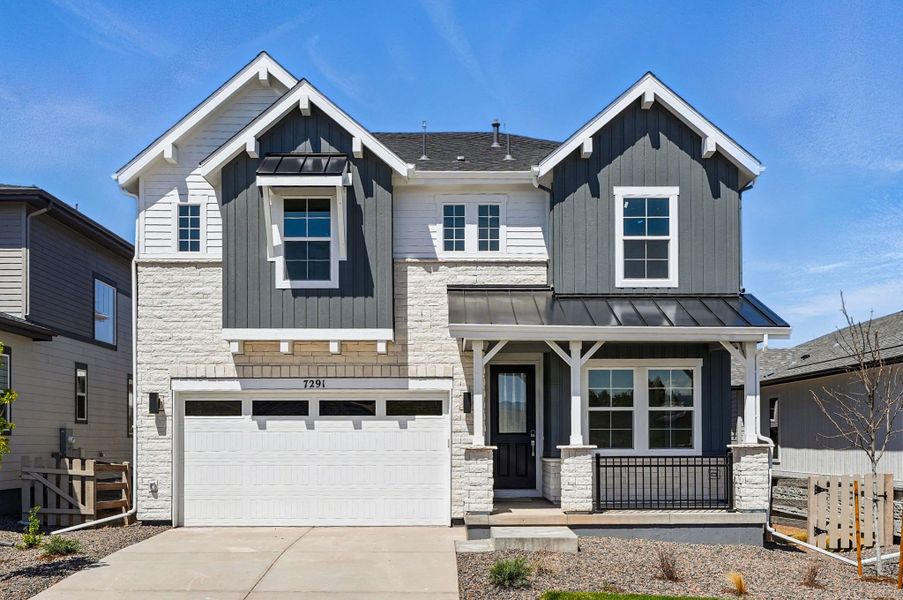 Front exterior of a home in the Sterling Ranch Ascent Village community, located in Littleton, CO (Image 4).