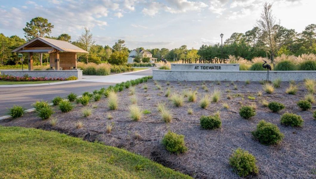 Entrance to the The Preserve at Tidewater community in Sneads Ferry, NC, featuring signage and landscaping (Image 2).