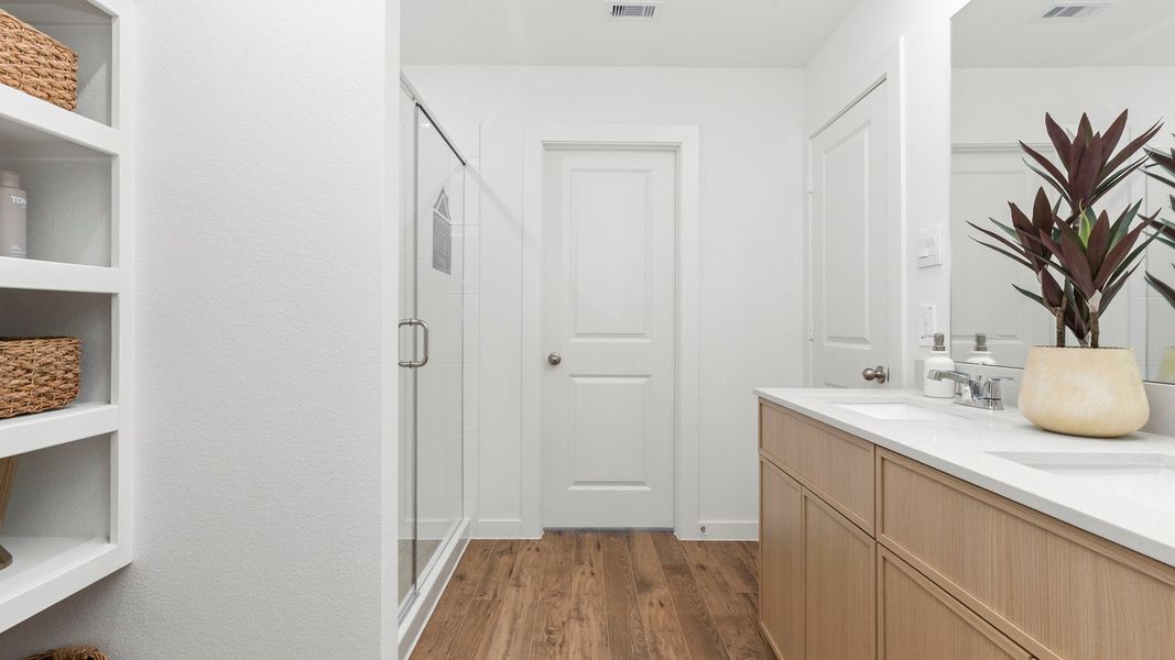 Furnished interior in a model home at Villarosa at Tamarron in Katy (Image 34).