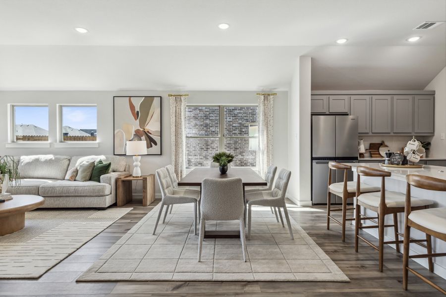 REPRESENTATIVE PHOTO – Dining Room in a Diamond model home by Trophy Signature Homes