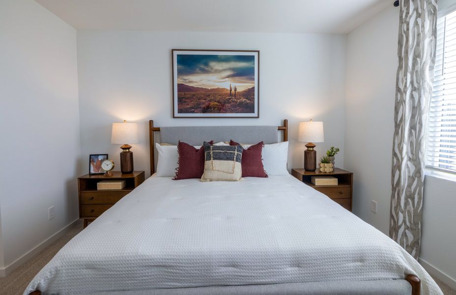 Furnished interior in a model home at Mountain View Estates Signature Series in Buckeye (Image 22).