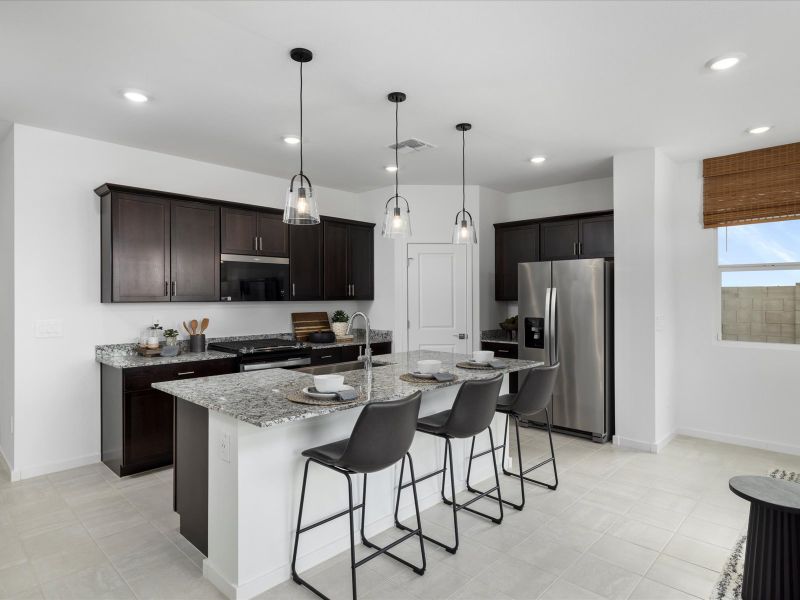 Furnished interior in a model home at Entrada Estate Series in Tolleson (Image 12).