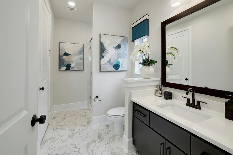 Furnished interior in a model home at Lariat - 60' in Liberty Hill (Image 23).