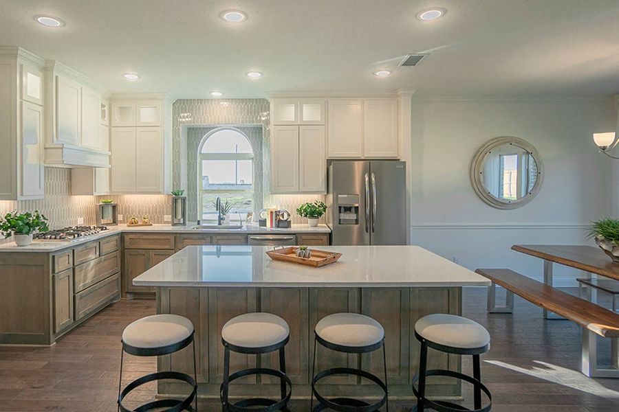 Furnished interior in a model home at Woodcreek in Fate (Image 7).