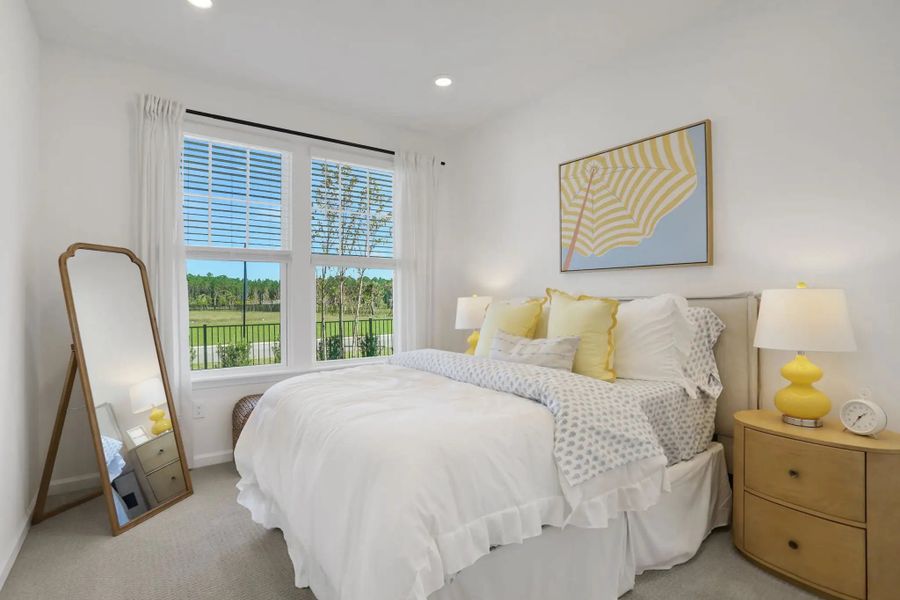 Furnished interior in a model home at Seminole Trace - Villas in Palm Coast (Image 12).