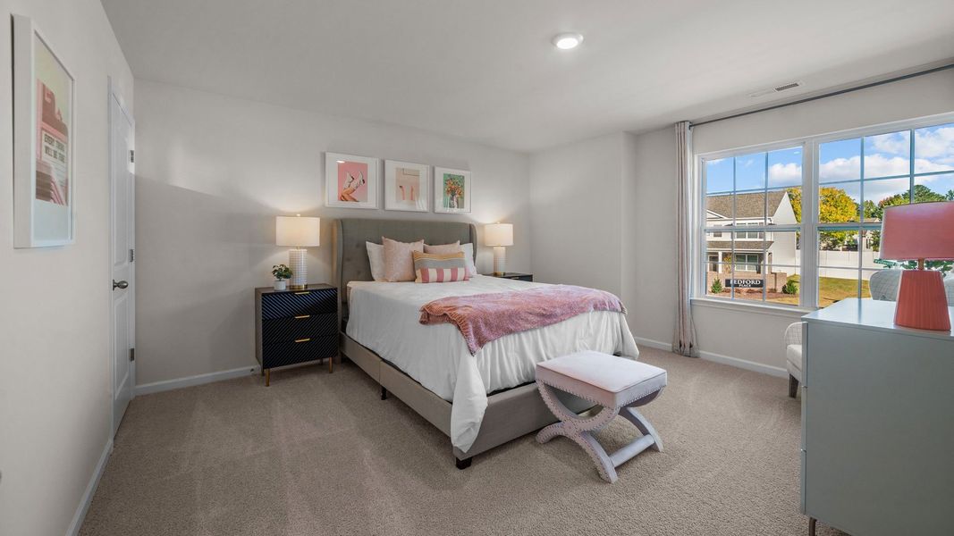 Furnished interior in a model home at Bedford Place in Wilson (Image 19).