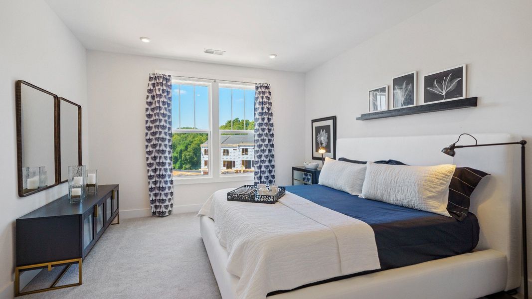 Furnished interior in a model home at Montgomery Chase in Greenville (Image 14).