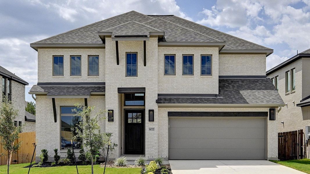 Front exterior of a home in the Stevens Ranch 55' community, located in San Antonio, TX (Image 1).