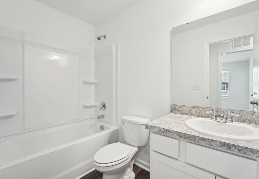 Furnished interior in a model home at Aster Towns in Summerville (Image 9).