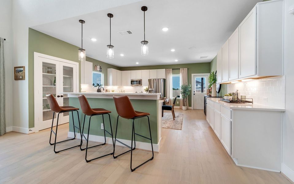 Furnished interior in a model home at Grande Estates in Bertram (Image 20).