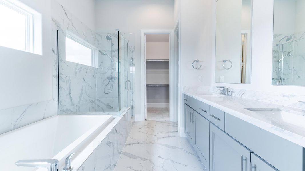 Furnished interior in a model home at Upper East River in Houston (Image 18).