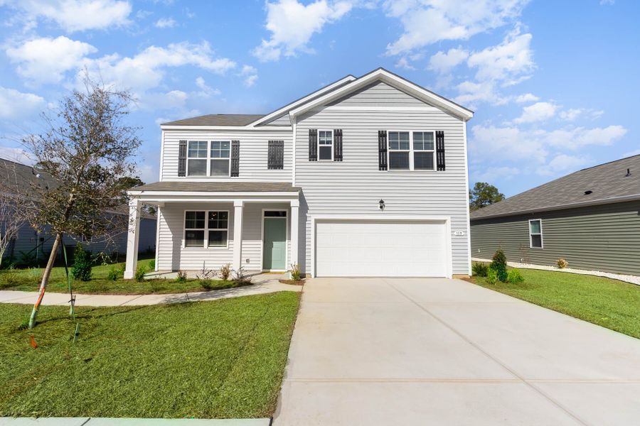 Front exterior of a home in the Island Green community, located in Myrtle Beach, SC (Image 15).
