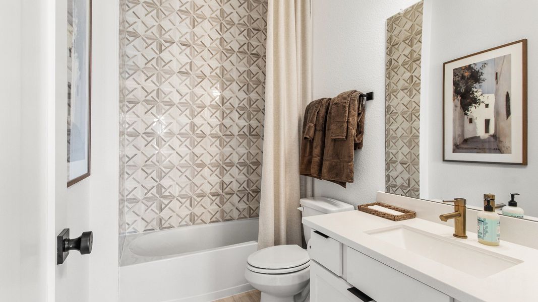 Furnished interior in a model home at Bridgeland Central in Cypress (Image 33).