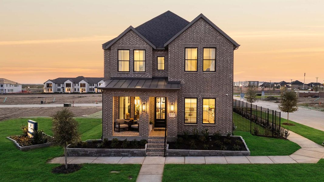Front exterior of a home in the Hazelwood 40' Series community, located in Frisco, TX (Image 4). Front exterior of a home in the Hazelwood 40' Series community, located in Frisco, TX (Image 4).