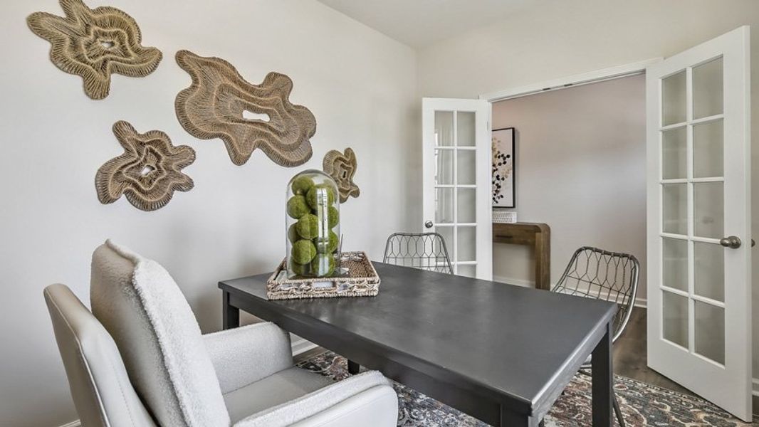 Furnished interior in a model home at The Reserve at Prestleigh in Wake Forest (Image 51).