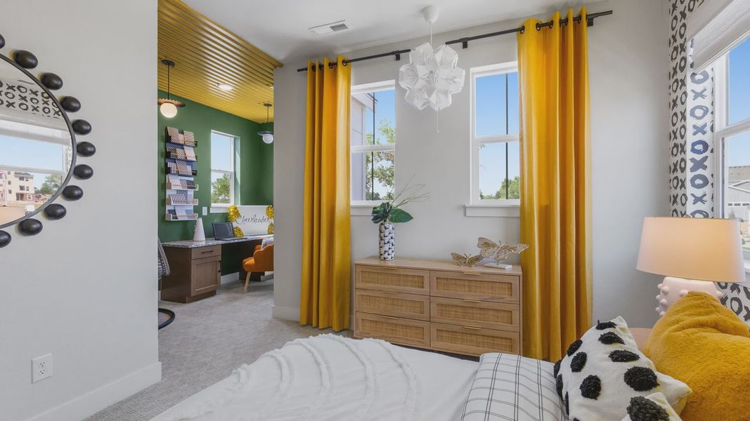 Exquisite bedroom featuring plush decor, standout mustard curtain, sleek rattan dresser in Dillon Pointe. Exquisite bedroom featuring plush decor, standout mustard curtain, sleek rattan dresser in Dillon Pointe.