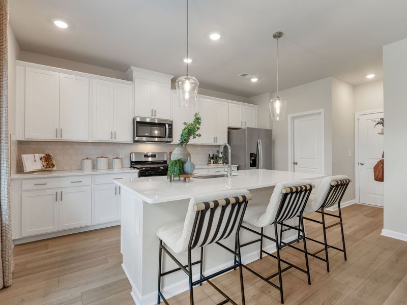 Furnished interior in a model home at Northwoods at Mirror Lake in Villa Rica (Image 6).