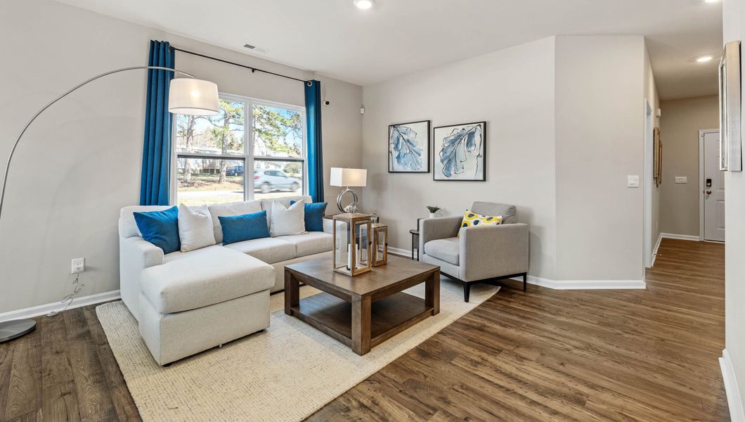 Furnished interior in a model home at Covington Village in Greer (Image 3).