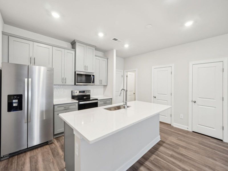 Furnished interior in a model home at Crossrail Station in Mooresville (Image 6).