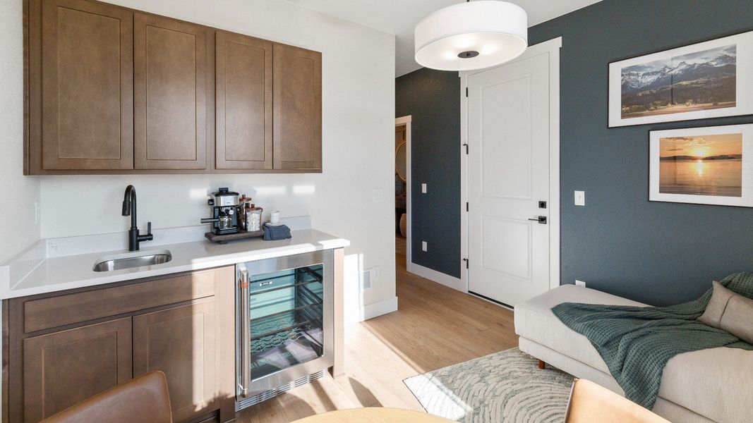 Furnished interior in a model home at Trevenna in Windsor (Image 9).