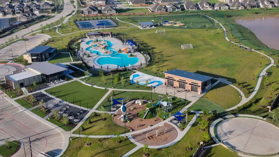 Aerial view of the Sunterra: Landmark Collection community in Katy, TX, showing layout and nearby surroundings (Image 1). Aerial view of the Sunterra: Landmark Collection community in Katy, TX, showing layout and nearby surroundings (Image 1).