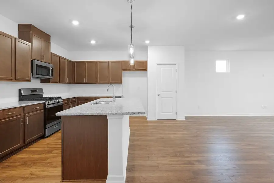 Furnished interior in a model home at Weatherfield in Buford (Image 4).