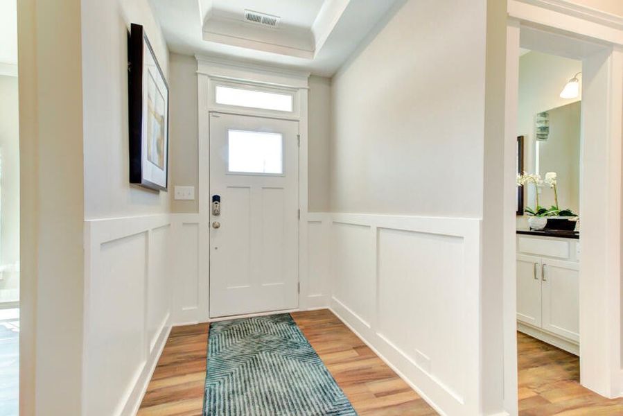 Furnished interior in a model home at CraigStone in Woodruff (Image 4).