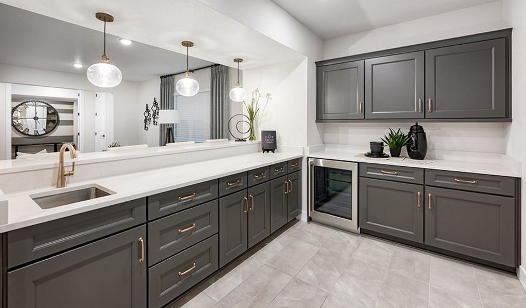 Furnished interior in a model home at Chateau at the Meadows in Castle Rock (Image 14).