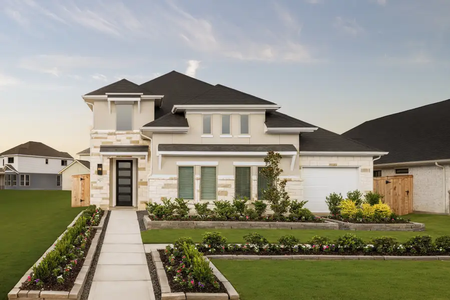 Front exterior of a home in the Candela community, located in Richmond, TX (Image 5).