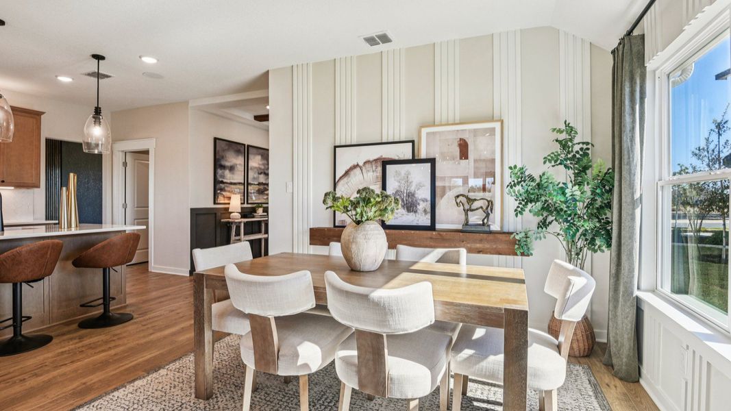 Casual dining area opens to the great room and has plenty of windows for natural light Casual dining area opens to the great room and has plenty of windows for natural light