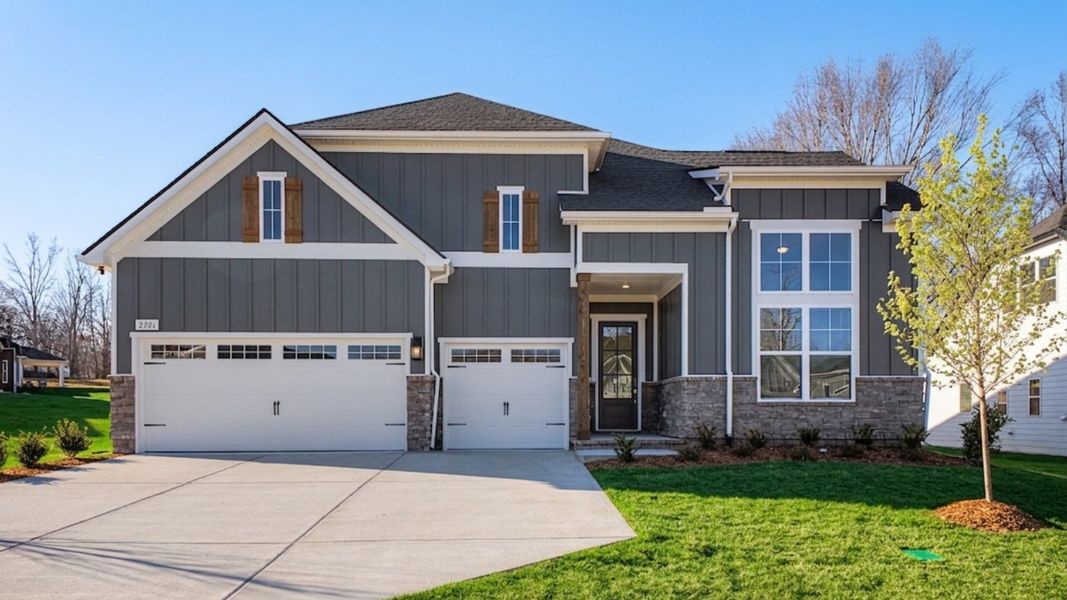 Front exterior of a home in the Brush Creek community, located in Fairview, TN (Image 8).