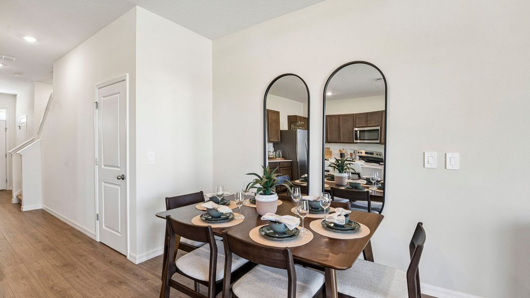 Furnished interior in a model home at Sanctuary at Citrus Park Townhomes in Tampa (Image 17).