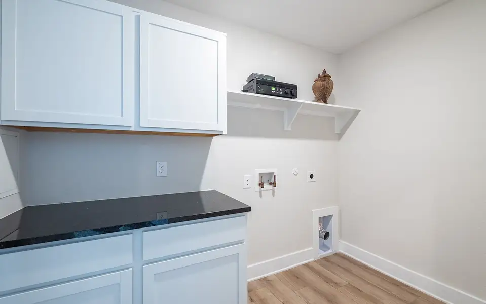 Furnished interior in a model home at The Grove in Sherman (Image 42).