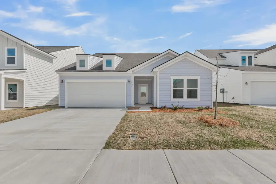 Front exterior of a home in the Tea Farm community, located in Ravenel, SC (Image 3).