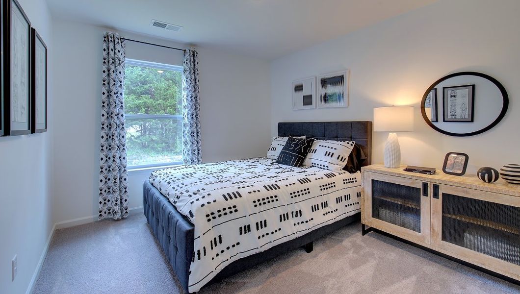 Furnished interior in a model home at Heritage Park in Fletcher (Image 36).