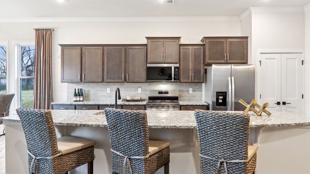 Furnished interior in a model home at Reserve at Tap Root Farms in Fletcher (Image 18).