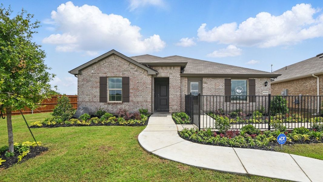 Front exterior of a home in the Hickory Grove community, located in Krum, TX (Image 2).