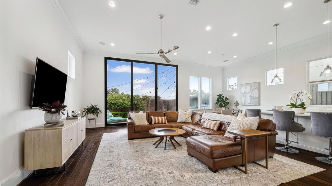 Furnished interior in a model home at Cottage Grove Lake Phase 2 in Houston (Image 6).