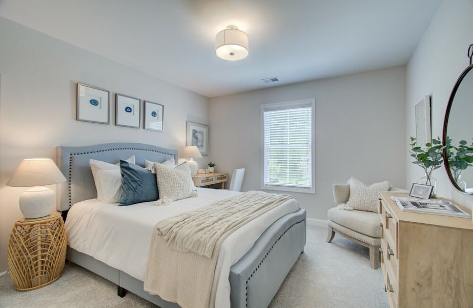 Furnished interior in a model home at Bluffs at Bells Ferry in Marietta (Image 6).