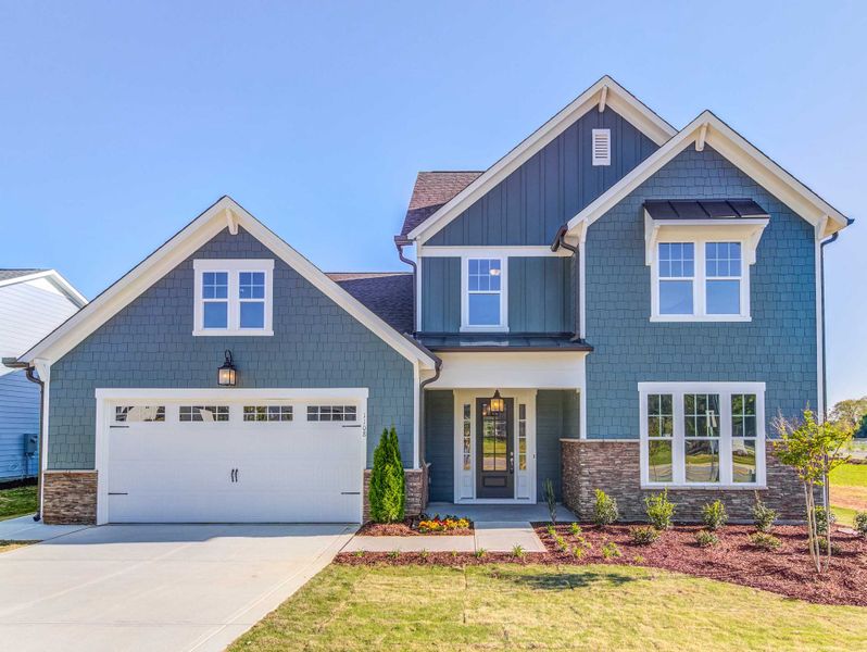 Front exterior of a home in the Cedar Crest - Fuquay-Varina - Robuck Homes community, located in Fuquay Varina, NC (Image 4).