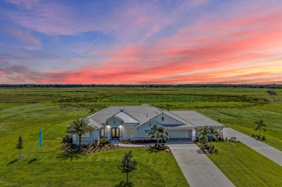 Front exterior of a home in the Hampton Lakes community, located in Sarasota, FL (Image 34). Front exterior of a home in the Hampton Lakes community, located in Sarasota, FL (Image 34).