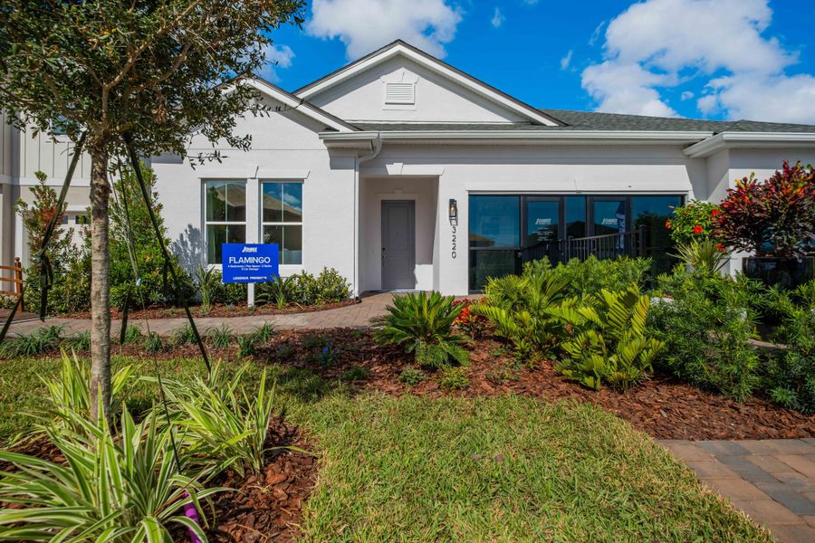 Front exterior of a home in the Legends Preserve community, located in Daytona Beach, FL (Image 1).