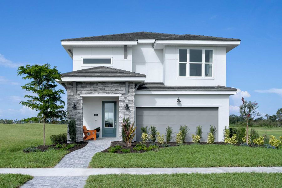Front exterior of a home in the Vistera of Venice – Garden Series community, located in Nokomis, FL (Image 3).