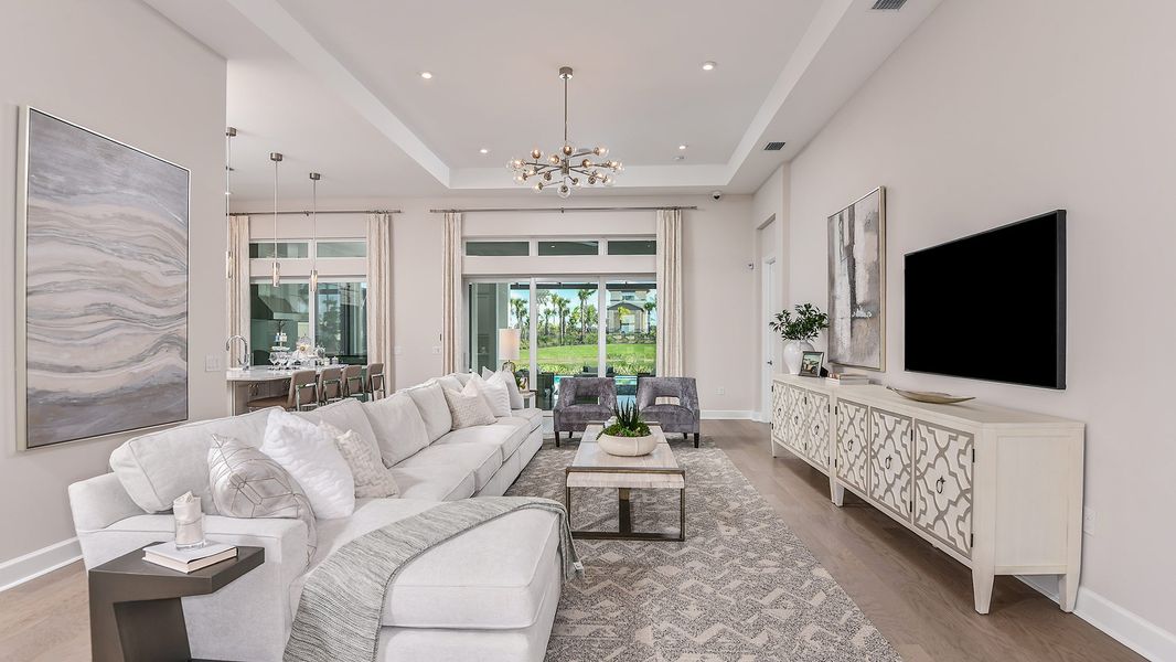 Furnished interior in a model home at Esplanade by the Islands in Naples (Image 62).