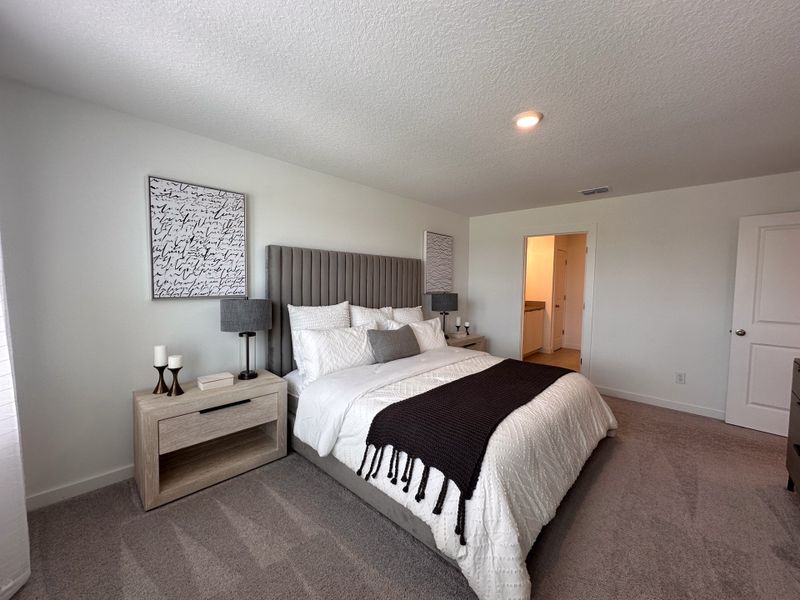 Furnished interior in a model home at The Enclaves at Festival Cove in Davenport (Image 30).