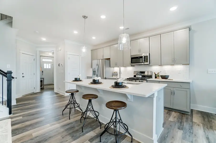 Furnished interior in a model home at Attenborough Townhomes in Piedmont (Image 4).
