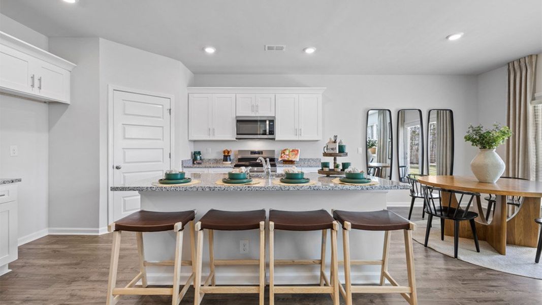 Furnished interior in a model home at Southwind Village in Evans (Image 5). Furnished interior in a model home at Southwind Village in Evans (Image 5).