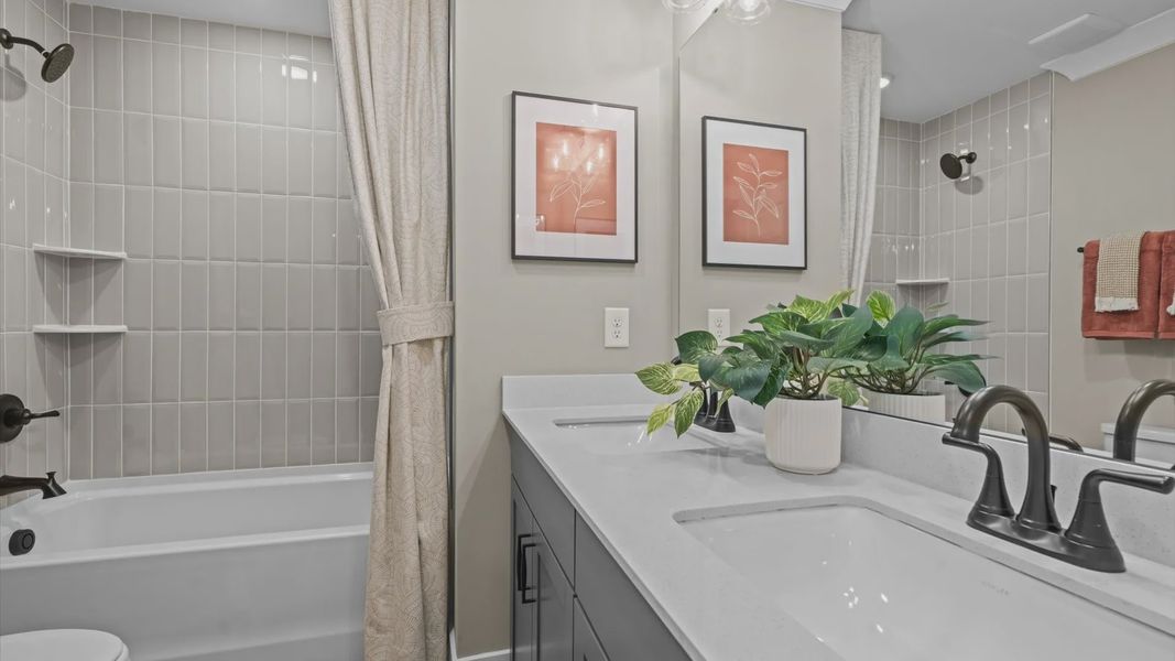 Furnished interior in a model home at North First Street Townes in Mebane (Image 21).