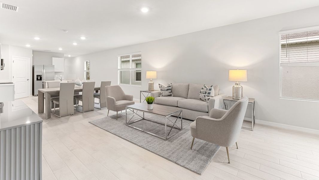 Furnished interior in a model home at Coral Lakes - Tradition & Express in Punta Gorda (Image 37).